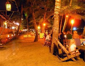 Cabarete night life - beach restaruants lit up