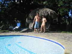 Surfers relax poolside