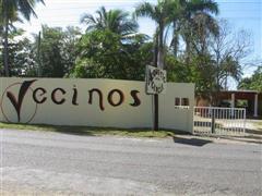 Vecinos wall sign