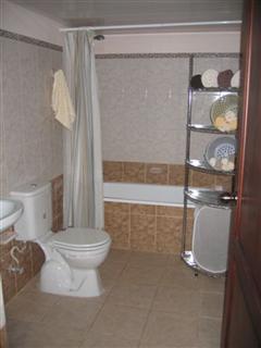 Condo bathrooms with tubs + showers